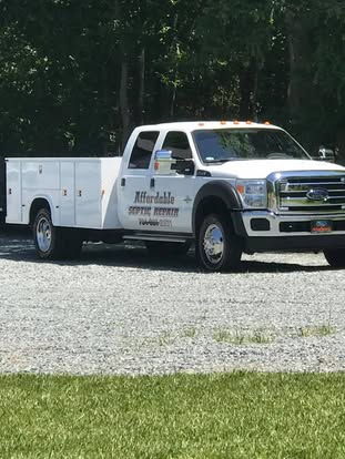 Affordable Septic Repair truck after a pump service call